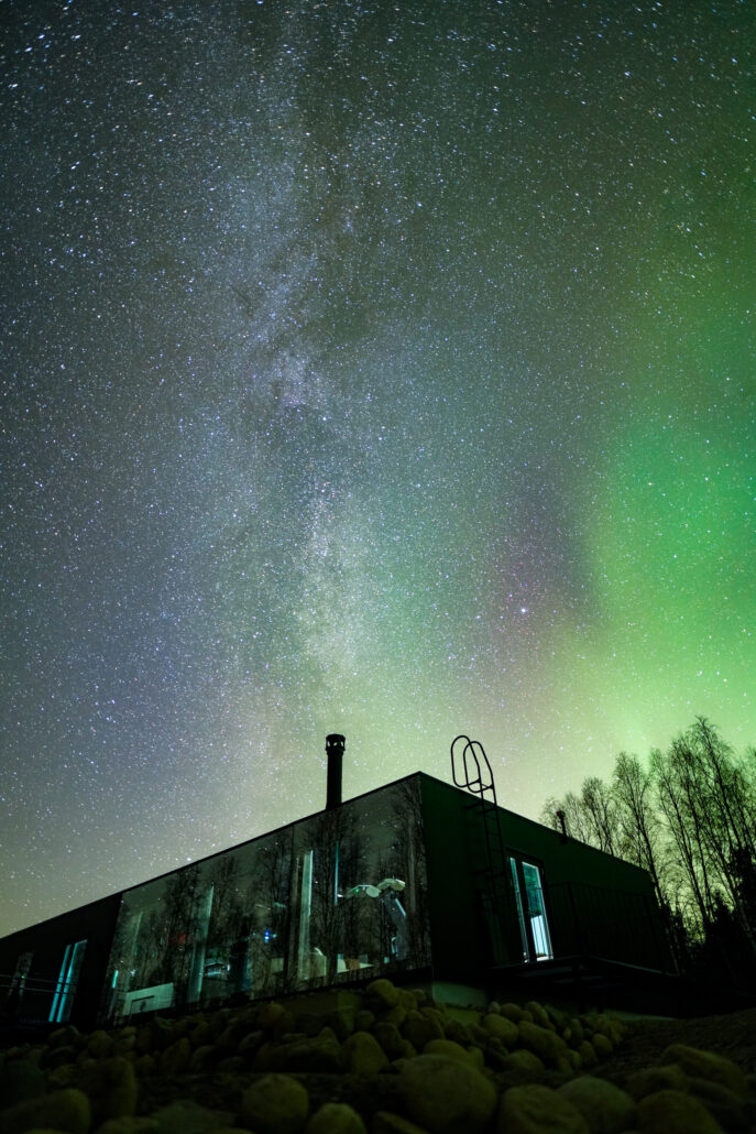 The Silver Birch Resort and the Northern Lights glowing over The Birch Restaurant